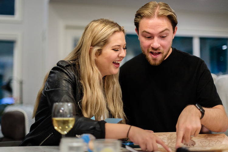 Games Night in an envelope and tabletop Escape Room Game. Similar to an Exit Game. Same genre as murder mystery.