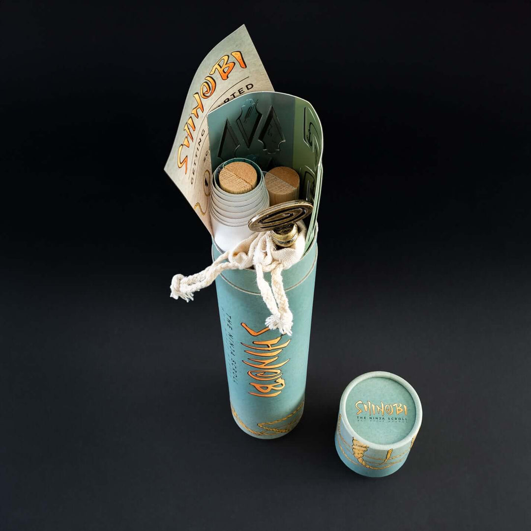 Shinobi: The Ninja Scroll. Games Night in an envelope and tabletop Escape Room Game. Similar to an Exit Game. Same genre as murder mystery.